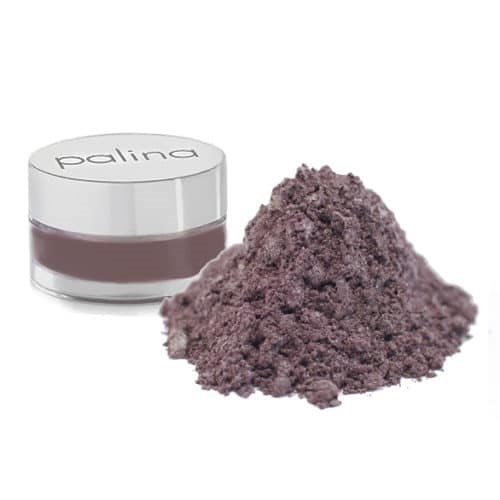 Ein kleiner Behälter mit der Aufschrift 'PALINA' neben einem Haufen lila Pulver.
