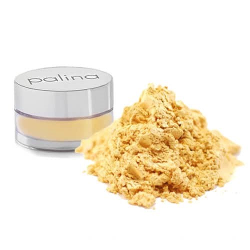 Gelbes Pulver neben einem kleinen Behälter mit der Aufschrift 'palina'. Es sieht aus wie ein Kosmetik- oder Kräuterprodukt.