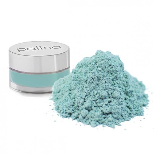 Blaues Pulver neben einem kleinen Behälter mit der Aufschrift 'palina', wahrscheinlich ein Kosmetik- oder Hautpflegeprodukt.