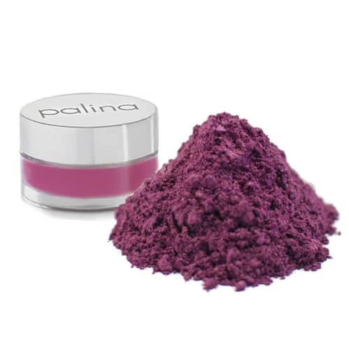 Ein kleiner Behälter mit rosa Creme und eine Ansammlung von violettem Pulver.