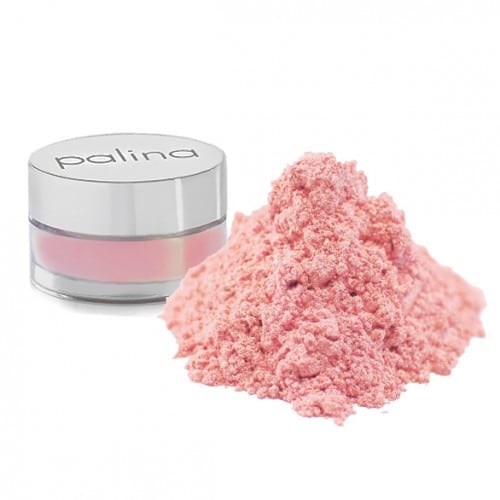 Rosa Pulver vor einem kleinen Behälter mit 'palina' Beschriftung.