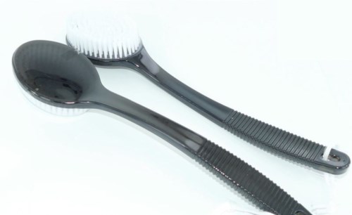 Two black plastic hairbrushes, one with a rounded head and the other with a rectangular head.