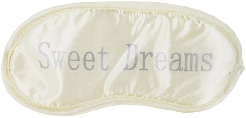 Ein Seiden-Schlafmaske mit den Worten "Sweet Dreams" darauf.