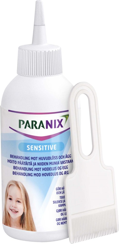 En flaska Paranix Sensitive-behandling mot huvudlöss och ägg med en kam vid sidan av.