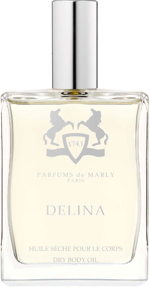 En tydlig flaska med silverlock märkta Delina, innehållande torr kroppsolja från Parfums de Marly, Paris.
