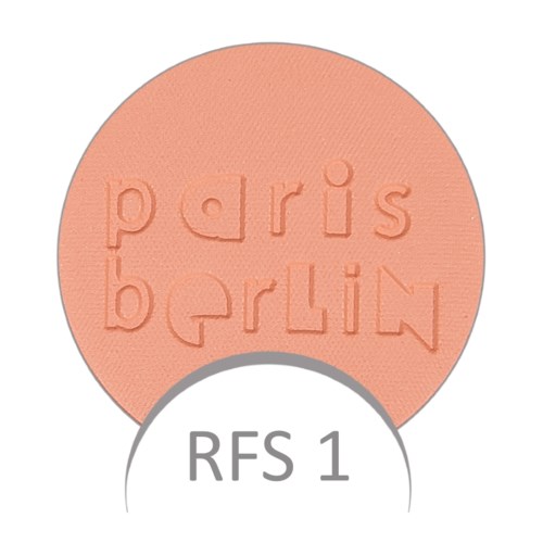 Okrągły różowy przedmiot z wyrytym napisem "paris.berlin". Poniżej etykieta "RFS 1".