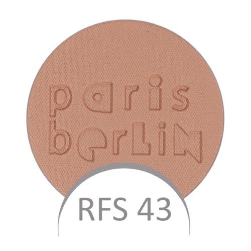 Okrągły, różowy róż do makijażu z wygrawerowanymi słowami "Paris Berlin" i etykietą "RFS 43."