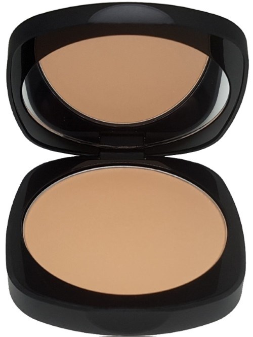 En liten dosa med beige makeuppuder och spegel, öppen. Mitt.