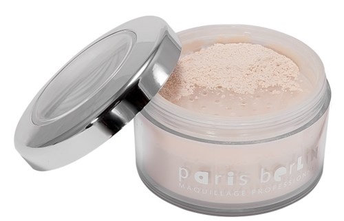 En rund behållare med pulver och silvrigt lock, märkt 'paris berlim' för makeup eller hudvård.