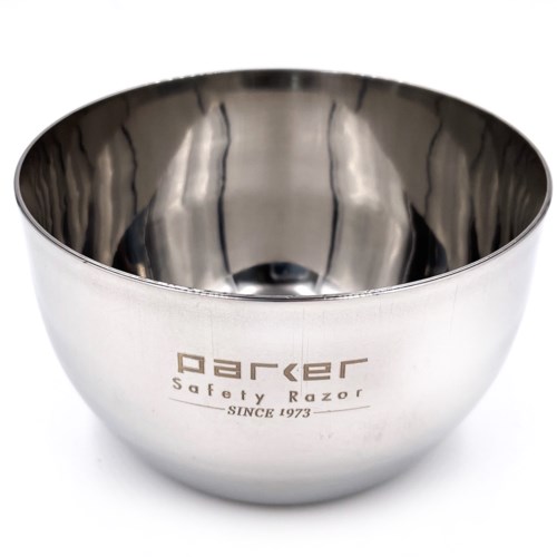 Eine glänzende Metallschüssel mit der Marke 'Parker' und 'Safety Razor', seit 1973.