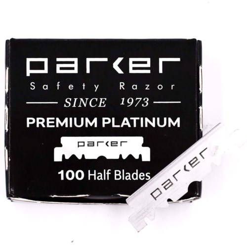 En svart förpackning med Parker säkerhetsrakblad med 100 halva blad, märkt 'Premium Platinum' och 'Since 1973'.