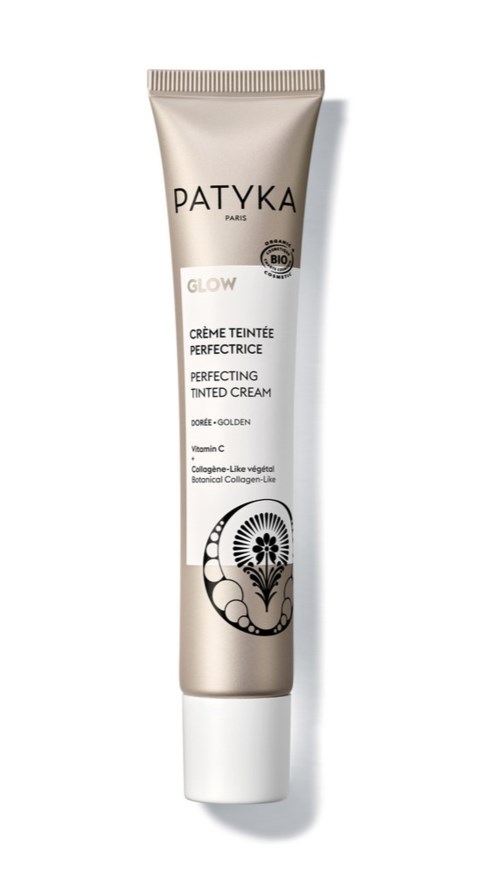 En tube med Patyka Glow Perfecting Tinted Cream med en blommönster längst ner.