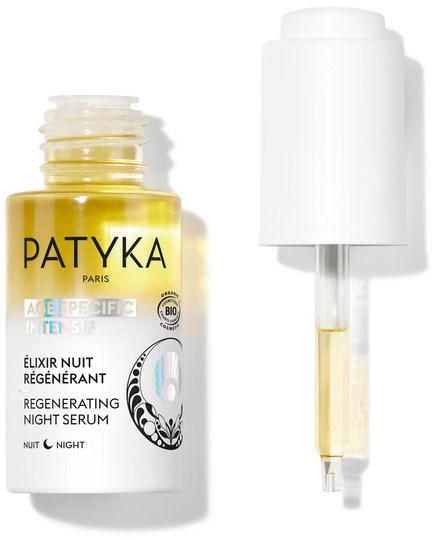 En flaska med Patyka återhämtande nattserum med pipett. Etikettsfärgen är vit och gul.