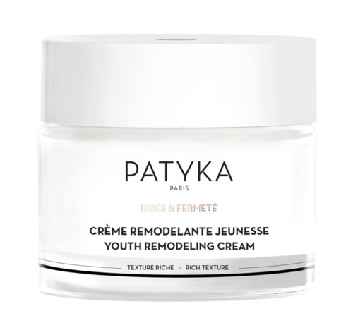 En tydlig burk med Patyka Youth Remodeling Cream med vit lock och svart text, för hudförtätning och struktur.