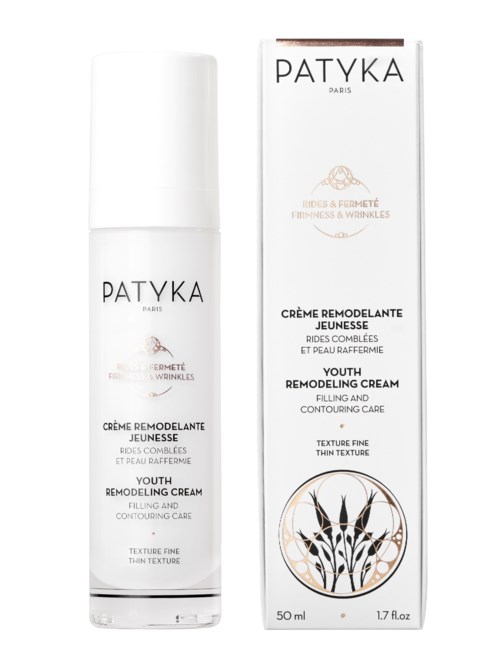 En vit flaska och box med Patyka Youth Remodeling Cream, avsedd för fin hud och rynkor.