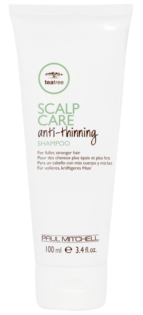 Hvid shampoo flaske med grøn og brun tekst, mærket til hovedbundspleje og mod hårtab. Mærke er Paul Mitchell.