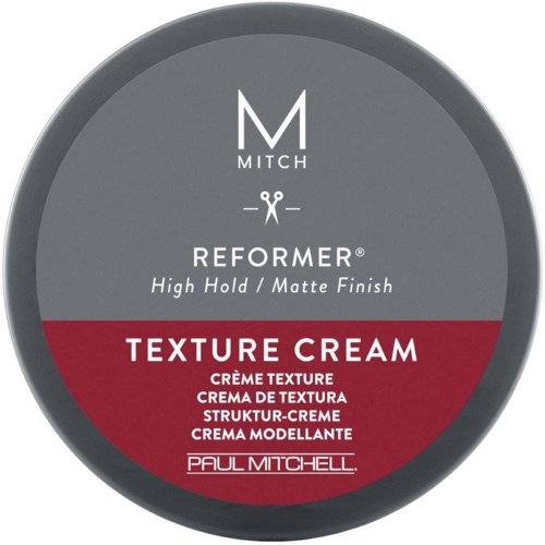A round container labeled 'Texture Cream' with two color sections, gray on top and red below, containing hair styling product.