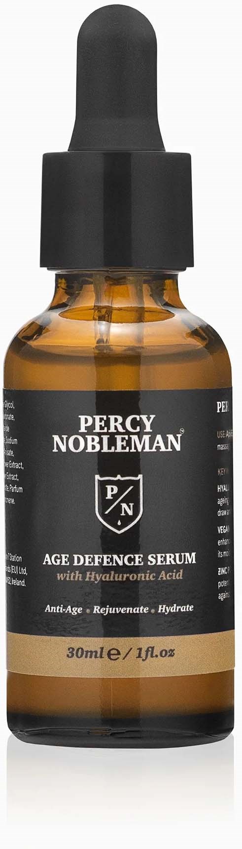 Kleine braune Flasche mit schwarzem Tropfenzapfenverschluss, beschriftet Percy Nobleman Age Defence Serum mit Hyaluronsäure.