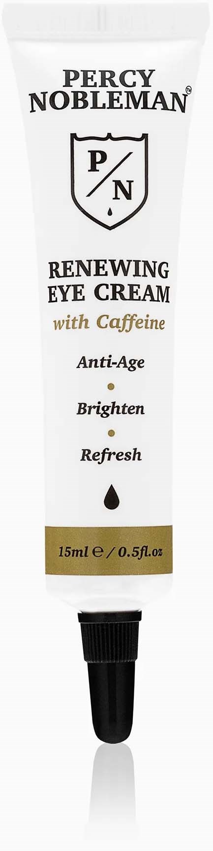Eine weiße Tube Percy Nobleman Augencreme mit schwarzem Deckel, hebt Koffein, Anti-Age, Aufhellung und Erfrischung hervor.