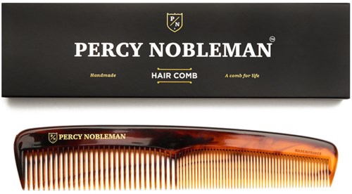 Ein Percy Nobleman Haarkamm mit schwarzer Schachtel und goldener Schrift, mit Schildpatt-Design am Griff.