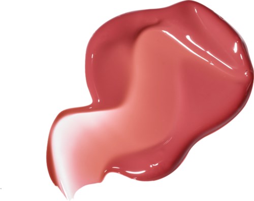 Pinkish-beige glossy substance with irregular shape and smooth surface. Likely a cosmetic or skincare product.