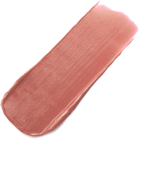 Een streek beige make-up of lipstick op een witte achtergrond.