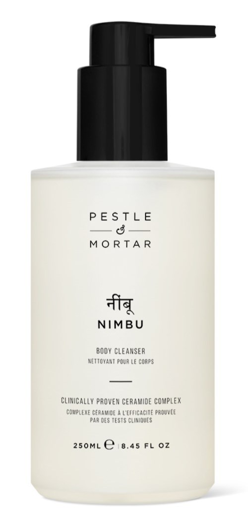 Biała butelka z czarnym dozownikiem oznaczona 'Pestle & Mortar Nimbus Body Cleanser'.