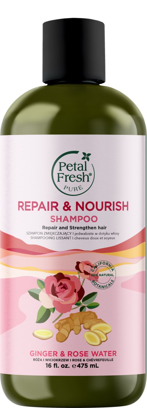 Eine grüne Flasche Petal Fresh Shampoo zum Reparieren und Nähren der Haare mit Ingwer und Rosenwasser.