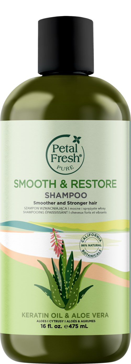 Eine grüne Flasche Petal Fresh Shampoo, mit der Bezeichnung 'Smooth & Restore' und Inhaltsstoffen wie Keratinöl und Aloe Vera.