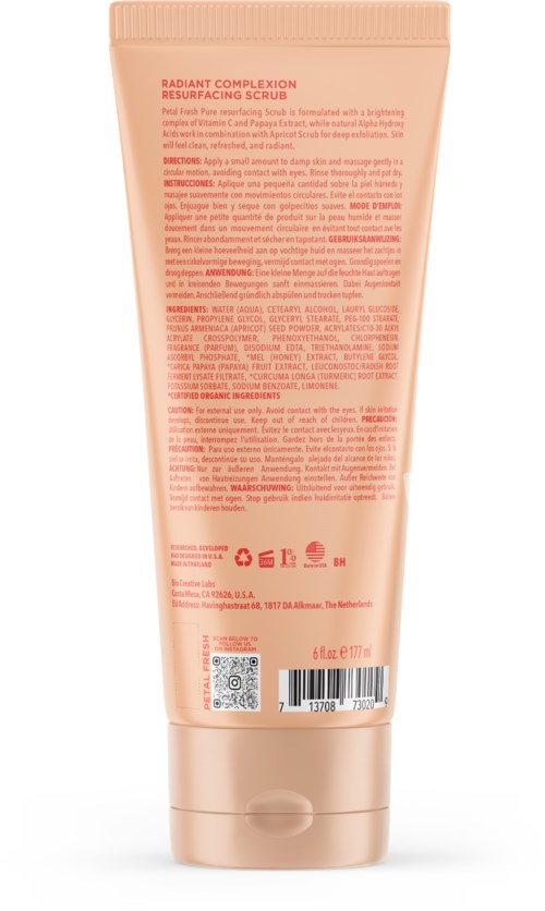 Ein pfirsichfarbiger Tube mit Gesichtspeeling, detaillierter Text und Barcode auf der Rückseite.