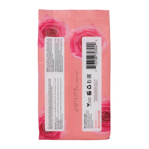 Ett rosa paket med rosbilder och streckkod, innehållande text och symboler, troligen ett kosmetiskt eller skönhetsprodukt.