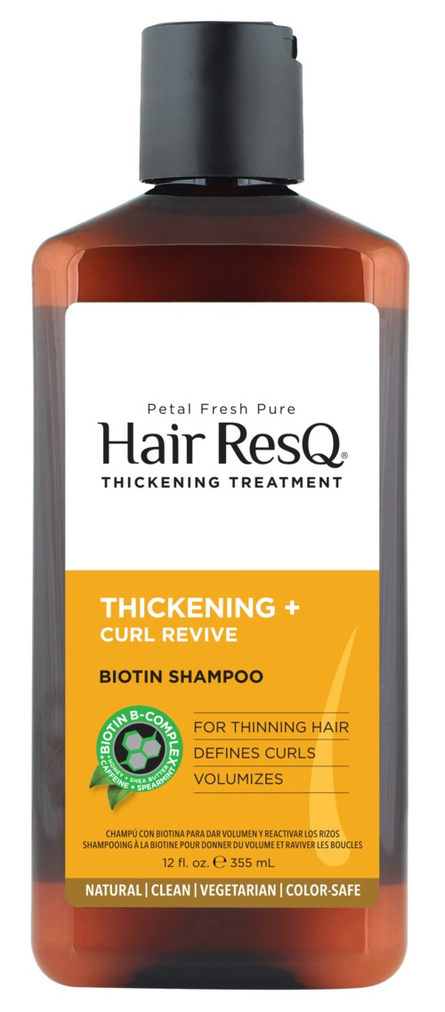 Eine braune Flasche Hair ResQ Shampoo mit weißem und gelbem Etikett, schwarzem Deckel und Text über Verdickung und Locken.