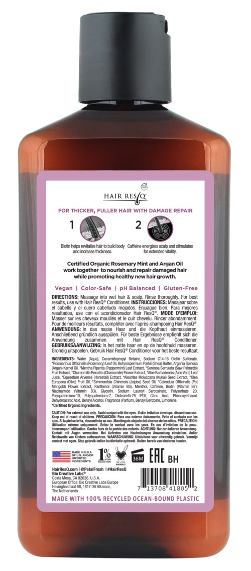 Eine braune Flasche mit schwarzem Deckel, mit einem pink-weißen Etikett mit Text und Anweisungen.