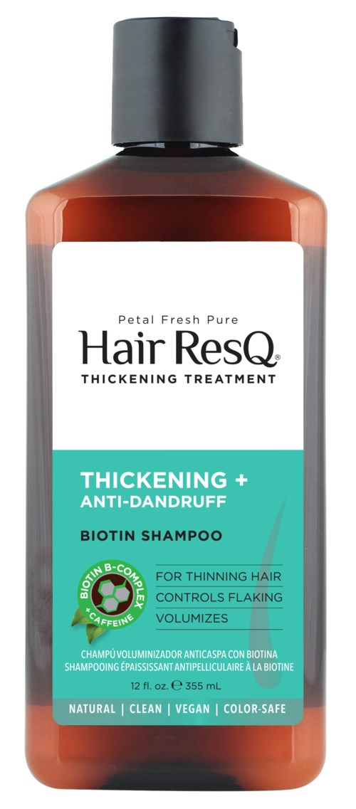 Eine braune Flasche Shampoo mit 'Hair ResQ' für Dickung und Anti-Schuppen, mit schwarzem Deckel und weißem und grünem Text.