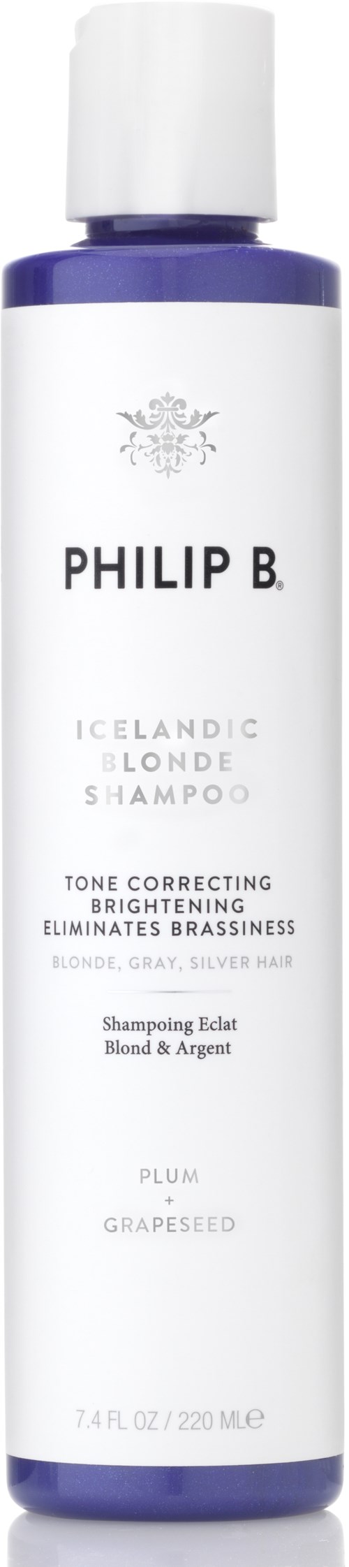 En hvit og lilla sjampo-flaske med svart tekst for Philip B. Ice Icelandic Blonde Shampoo for å lyse opp og fjerne rødlighet.