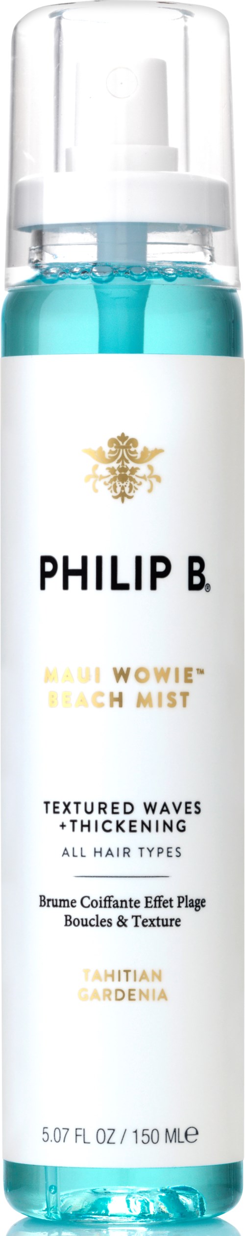 En blå sprayflaska märkt Philip B. med text om beach mist för hår. Guld snöflinga logga upptill.