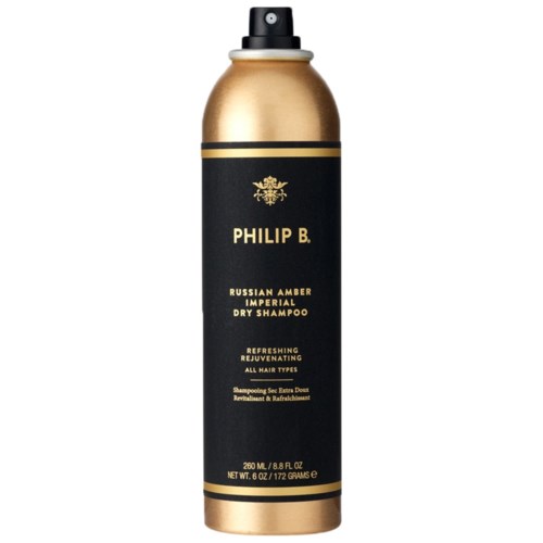 Svart og gull sjampoflaske merket 'Philip B. Russian Amber Imperial Dry Shampoo' med spraylokk.