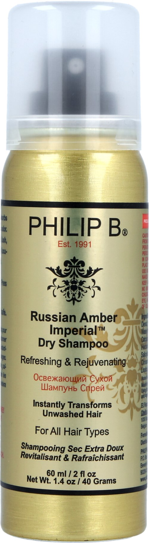 A small golden bottle of Philip B. Russian Amber Imperial Dry Shampoo, for all hair types, refreshes hair instantly.