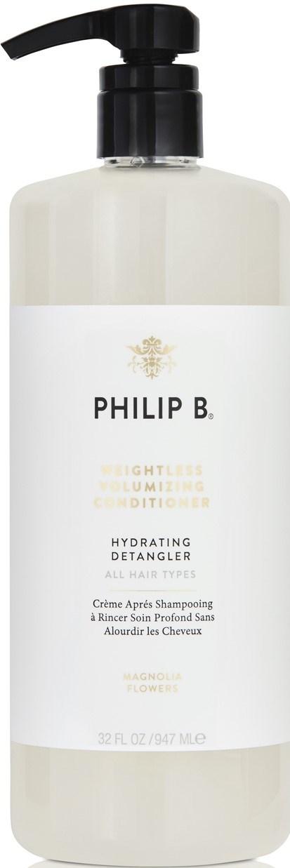 A white bottle with a black pump, labeled Philip B. and Hydrating Detangler for all hair types.