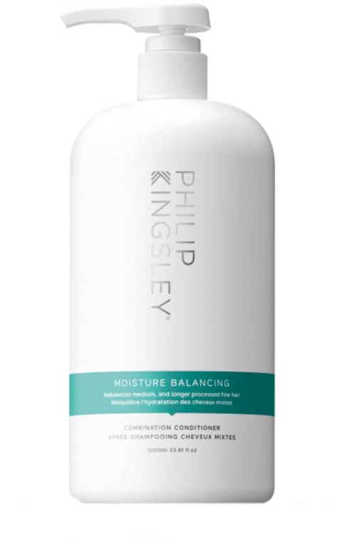 En hvit flaske med pumpe på toppen, merket 'Philips Inge via Moisture Balancing'. Det er en balsam for håret.