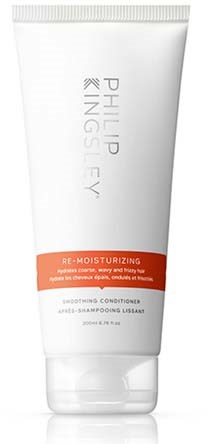 En hvit tube med Philip Kingsley Re-Moisturizing balsam for tørt, skadet hår, med en rød-oransje etikett.