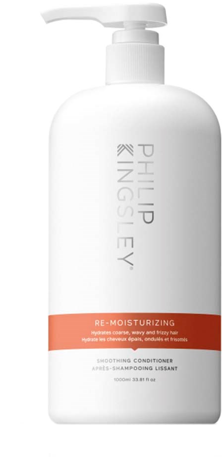En hvit flaske med pumpe, merket 'Philip Kingsley Re-Moisturizing' for hårbalsam.