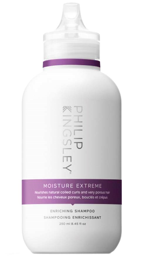 Hvit sjampo-flaske med lilla bånd, merket Philip Kingsley Moisture Extreme, for hårpleie.