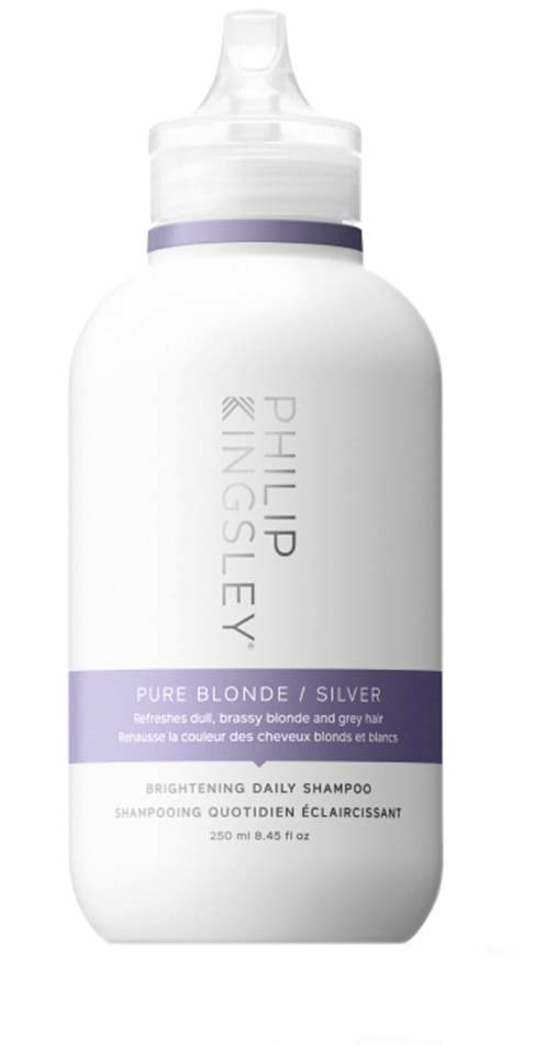 En hvit flaske med en lilla band, merket som Phillip Kingsley Pure Blonde silver shampoo, for å lyse opp håret.