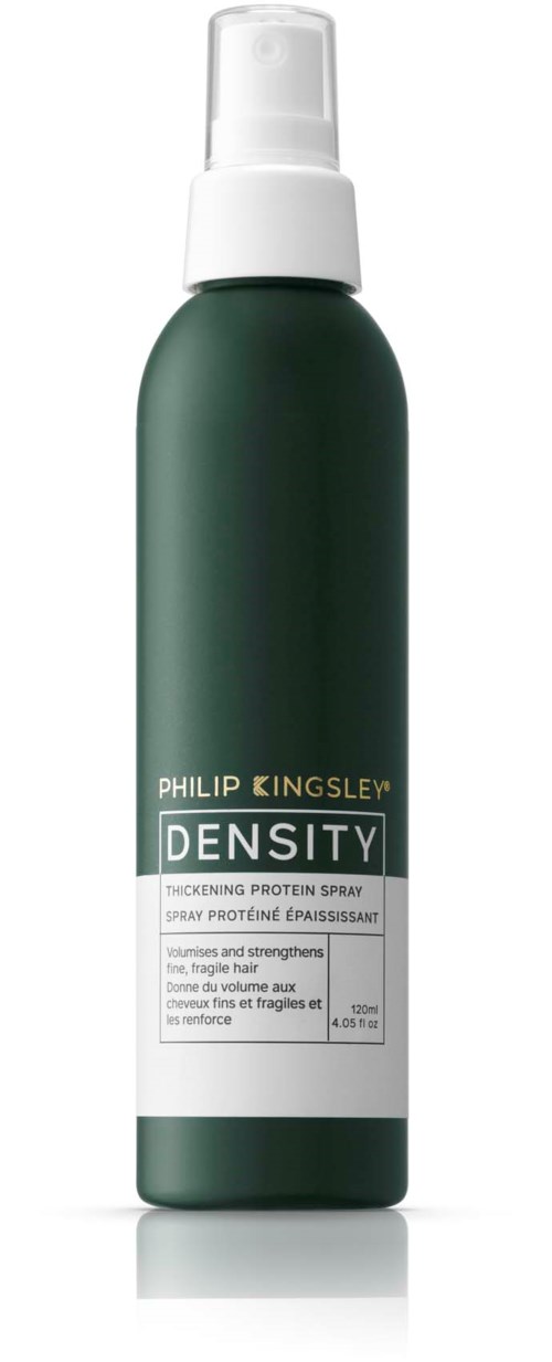 En mörkgrön sprayflaska märkta 'Philip Kingsley Density' för att göra håret tjockare och starkare.
