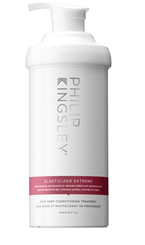 Valkoinen pullo pumppulla, merkinnällä Philp Kingsley ja Elasticizer Extreme pinkissä, hiushoitotuotteeksi.