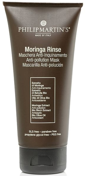 En mørk grå tube med Philip Martin's Moringa Rinse anti-forurensningsmaske, hvit tekst og svart lokk.