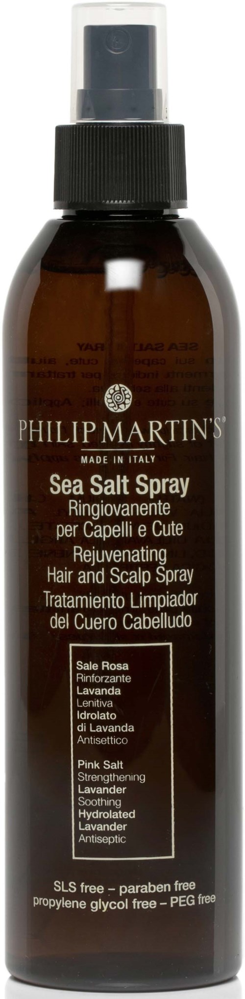 En brun sprutförpackning med etikett 'Sea Salt Spray' och svart spraymunstycke, används för hårvård.