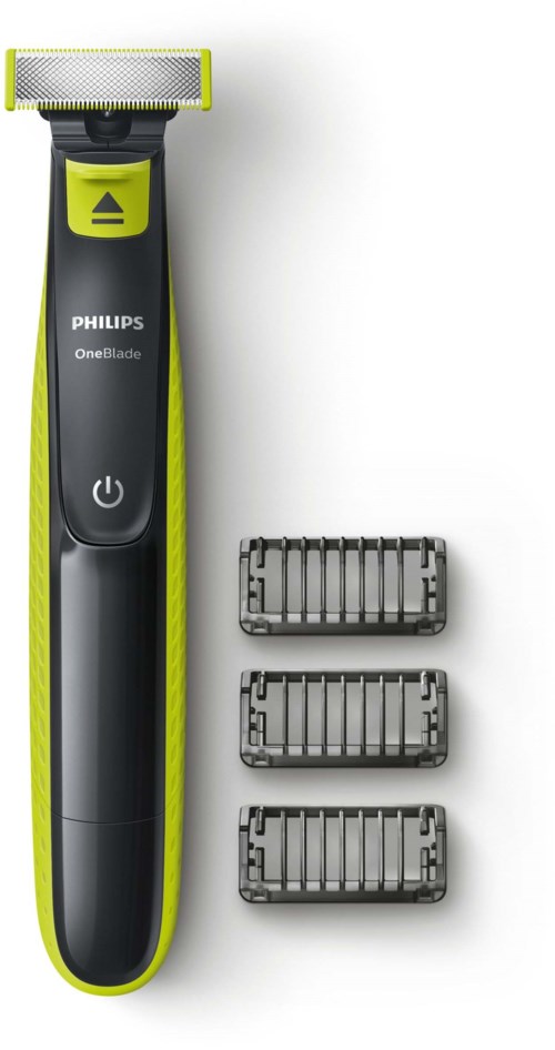 En Philips OneBlade elektrisk rakapparat med tre extra blad bredvid på en vit bakgrund.