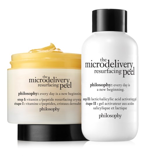 En burk med gul kräm och en vit flaska med hudvårdsprodukt som heter Microdelivery Resurfacing Peel.